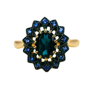 Złoty pierścionek z topazem London Blue