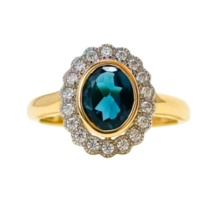 Złoty pierścionek z topazem London Blue