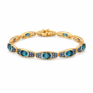 Złota bransoletka z topazami, szafirami i brylantami