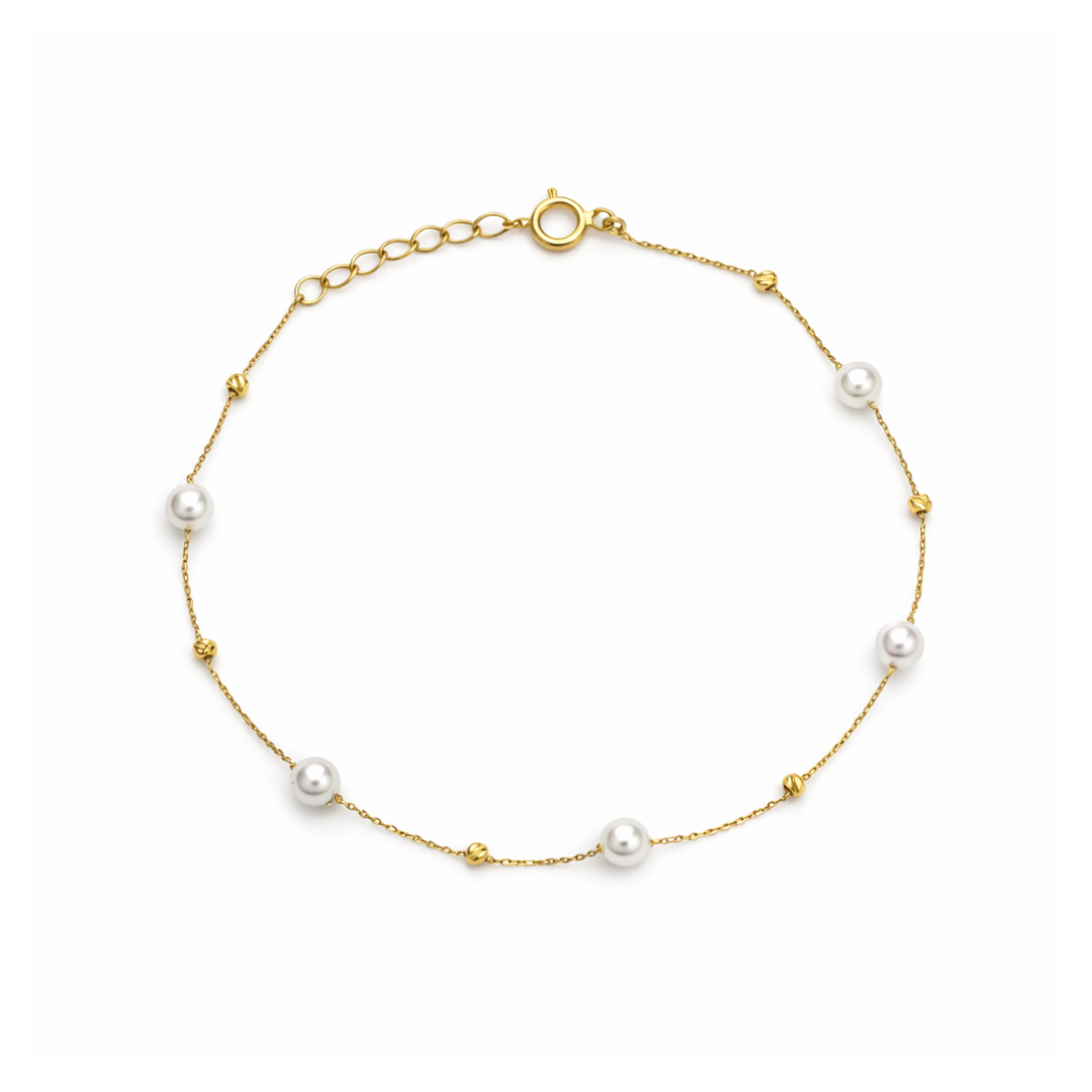 Złota bransoletka z perłami